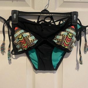 NEVER WORN BOTTOMS and matching bikini top from Xhileration